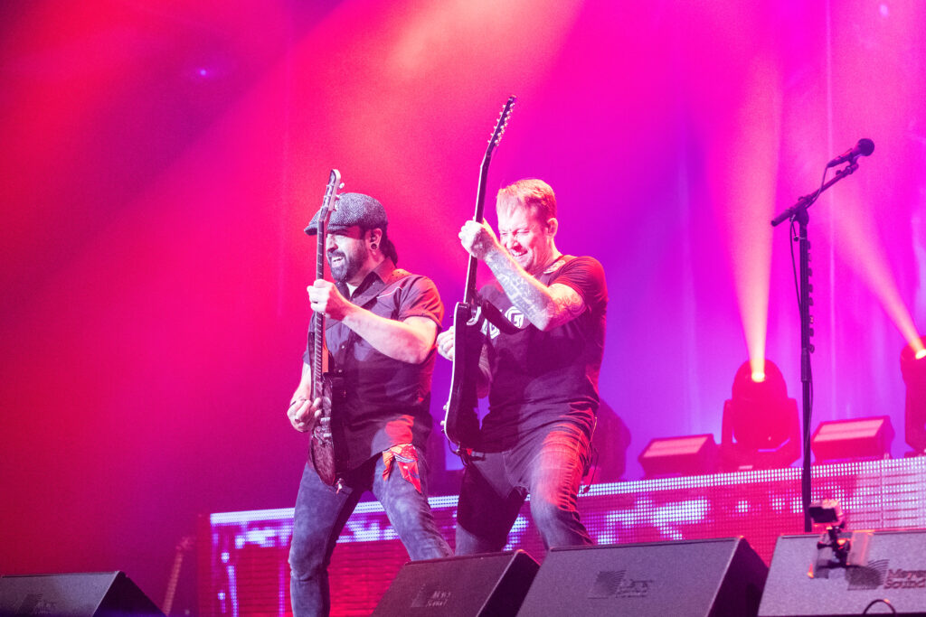 Michael Poulsen, lead singer and guitarist, and Rob Caggiano, guitarist of the heavy metal band Volbeat, at Rockhal in Luxembourg during their "Rewind, Replay, Rebound" tour in 2019