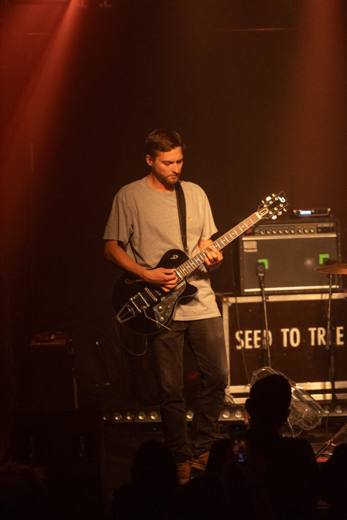 Miko Buraczyk, guitarist of the Luxembourgish band The Cookie Jar Complot, during a show at den Atelier