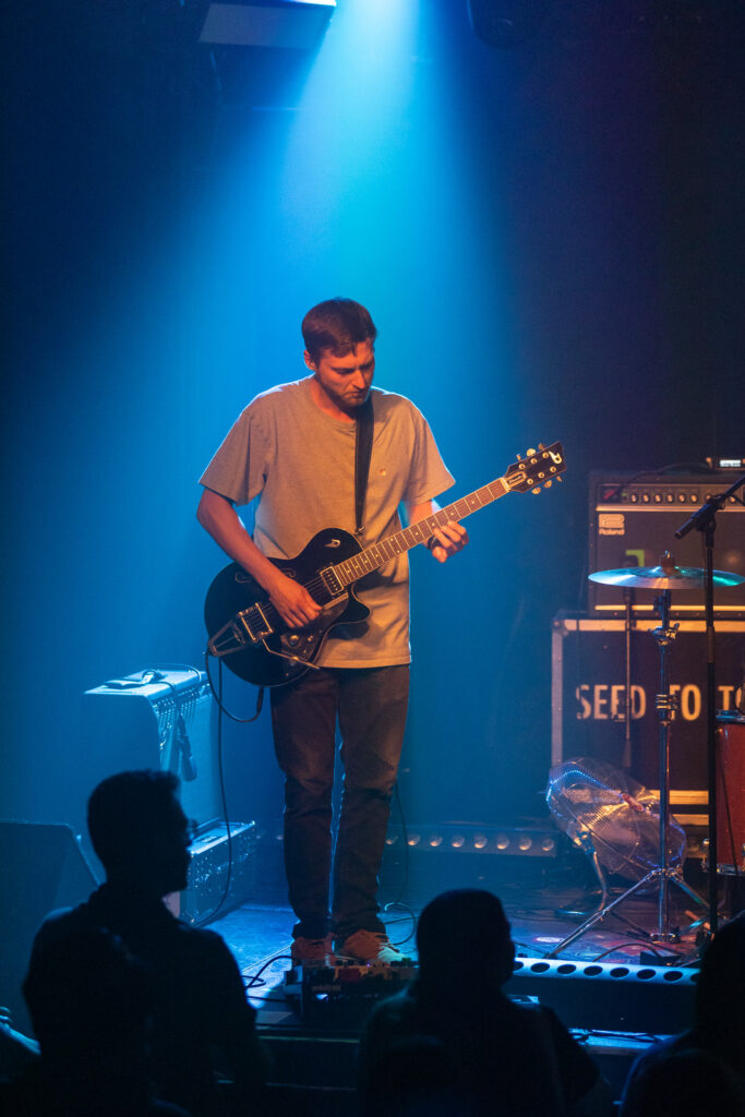 Miko Buraczyk, guitarist of the Luxembourgish band The Cookie Jar Complot, during a show at den Atelier