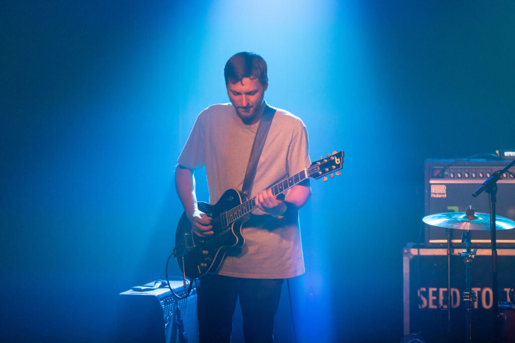 Miko Buraczyk, guitarist of the Luxembourgish band The Cookie Jar Complot, during a show at den Atelier