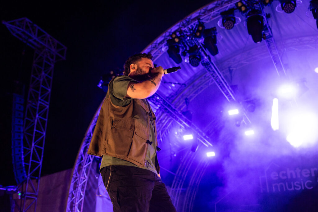 Luxembourgish musician Maale Gars on stage at Echterlive Music Festival